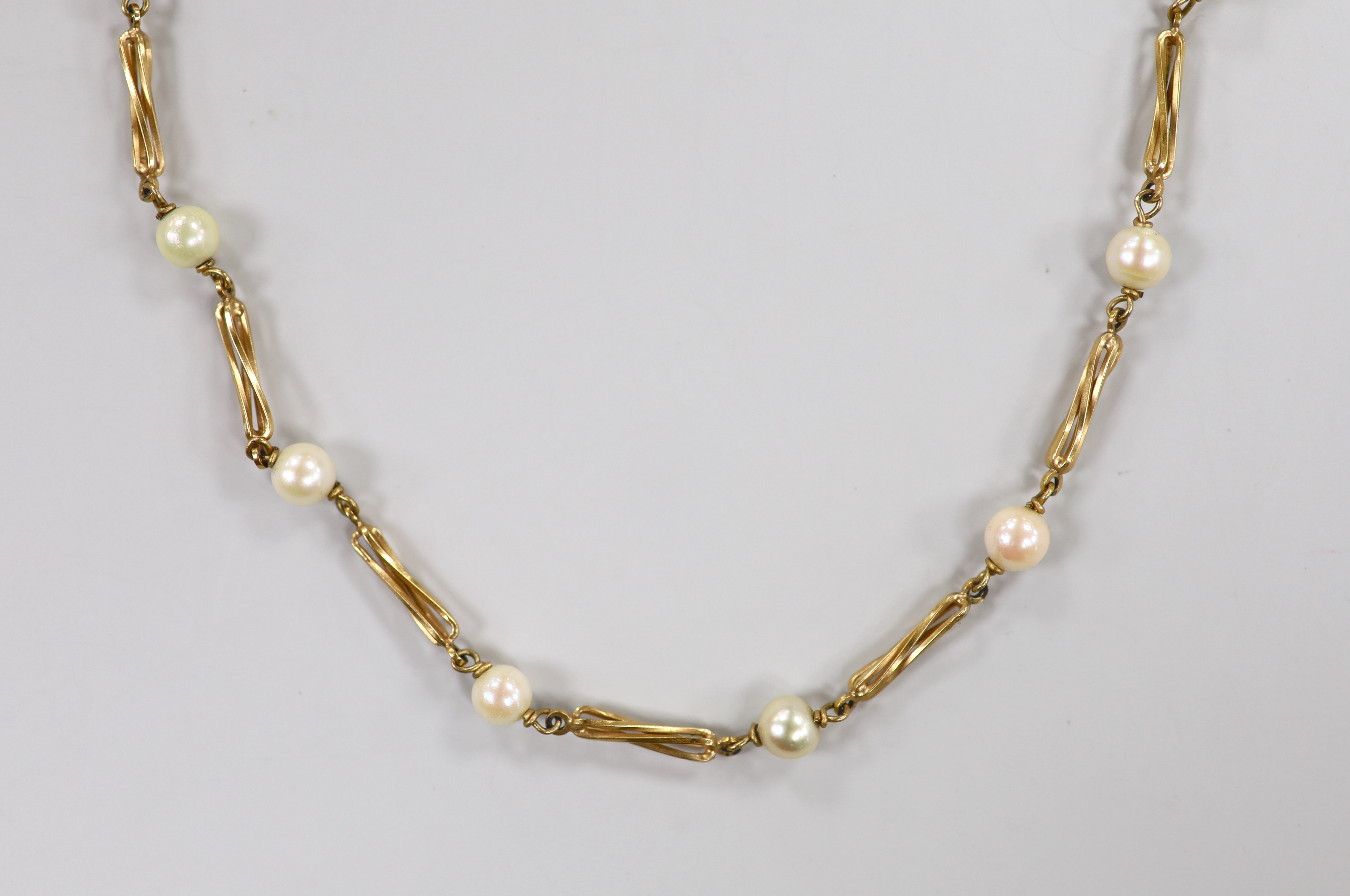 A modern 9ct gold, cultured pearl and entwined bar link necklace, 38cm, gross weight 10.8 grams.